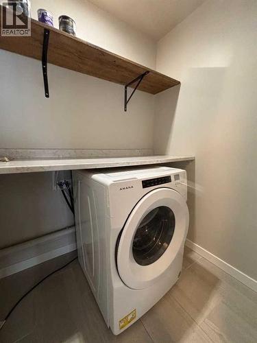 305, 9260 108 Avenue, Grande Prairie, AB - Indoor Photo Showing Laundry Room