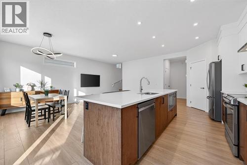 19 Rowley Park Nw, Calgary, AB - Indoor Photo Showing Kitchen With Upgraded Kitchen