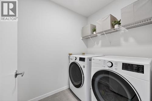 19 Rowley Park Nw, Calgary, AB - Indoor Photo Showing Laundry Room