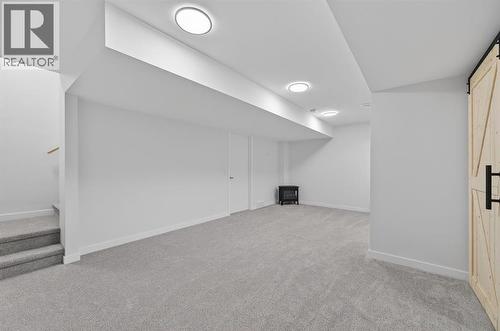 19 Rowley Park Nw, Calgary, AB - Indoor Photo Showing Other Room