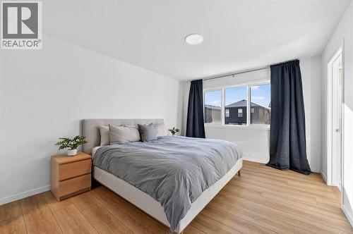 19 Rowley Park Nw, Calgary, AB - Indoor Photo Showing Bedroom