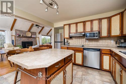 252 Maines Road, Tweed (Hungerford (Twp)), ON - Indoor Photo Showing Kitchen With Fireplace
