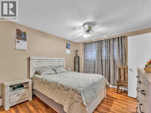 12002 Range Road 65, Rural Cypress County, AB - Indoor Photo Showing Bedroom
