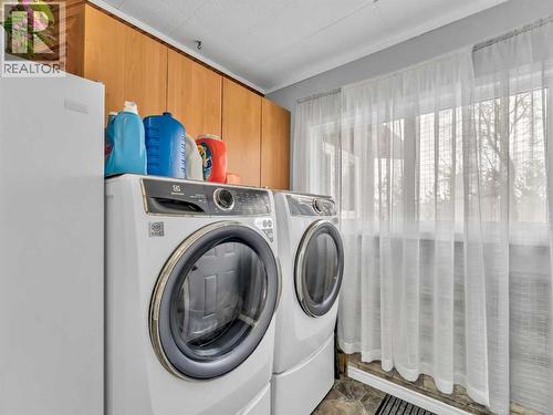 12002 Range Road 65, Rural Cypress County, AB - Indoor Photo Showing Laundry Room