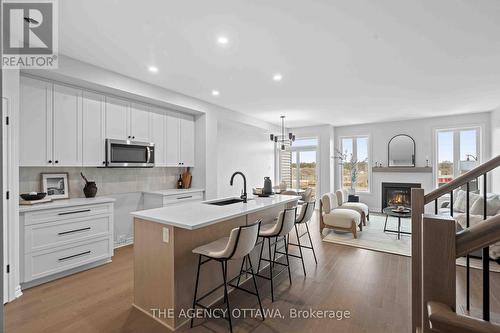 1150 Cope Drive, Ottawa, ON - Indoor Photo Showing Kitchen With Fireplace With Upgraded Kitchen