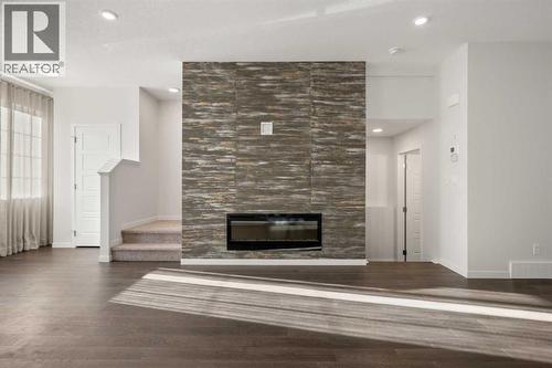 110 Wolf Creek Rise Se, Calgary, AB - Indoor With Fireplace