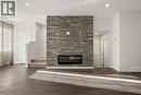 110 Wolf Creek Rise Se, Calgary, AB  - Indoor With Fireplace 