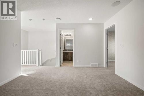 110 Wolf Creek Rise Se, Calgary, AB - Indoor Photo Showing Other Room