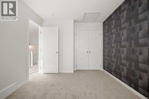 110 Wolf Creek Rise Se, Calgary, AB - Indoor Photo Showing Other Room