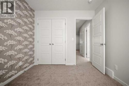 110 Wolf Creek Rise Se, Calgary, AB - Indoor Photo Showing Other Room