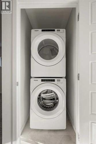 110 Wolf Creek Rise Se, Calgary, AB - Indoor Photo Showing Laundry Room