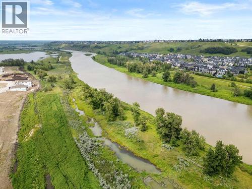 110 Wolf Creek Rise Se, Calgary, AB - Outdoor With Body Of Water With View