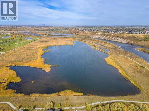 110 Wolf Creek Rise Se, Calgary, AB - Outdoor With Body Of Water With View