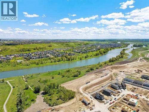 110 Wolf Creek Rise Se, Calgary, AB - Outdoor With Body Of Water With View