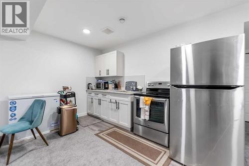 208 Dawson Circle, Chestermere, AB - Indoor Photo Showing Kitchen With Stainless Steel Kitchen