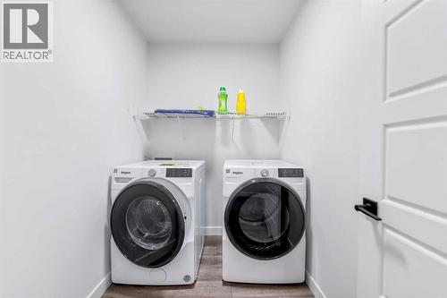 208 Dawson Circle, Chestermere, AB - Indoor Photo Showing Laundry Room