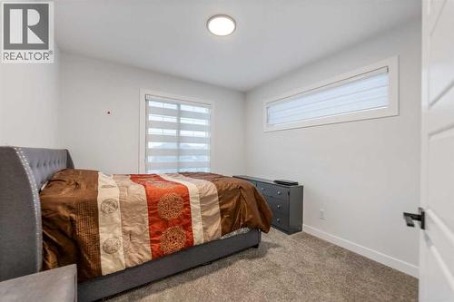 208 Dawson Circle, Chestermere, AB - Indoor Photo Showing Bedroom