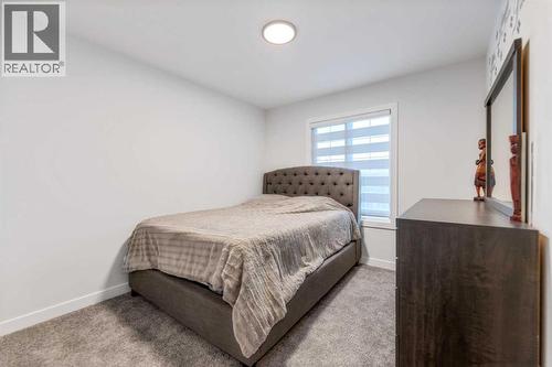 208 Dawson Circle, Chestermere, AB - Indoor Photo Showing Bedroom