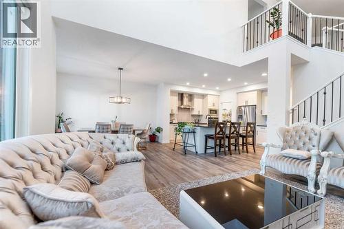 208 Dawson Circle, Chestermere, AB - Indoor Photo Showing Living Room