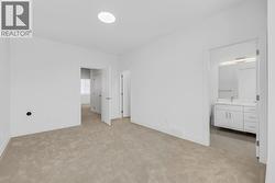 Photo of a similar home in the community. - 