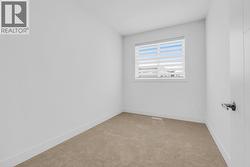 Photo of a similar home in the community. - 