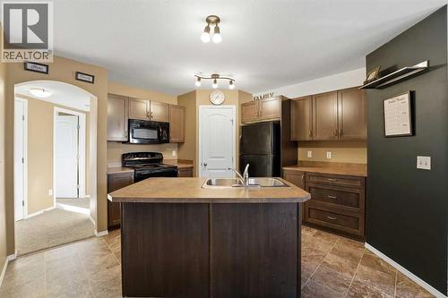1216, 31 Jamieson Avenue, Red Deer, AB - Indoor Photo Showing Kitchen
