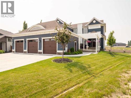 245 Prairie Rose Place S, Lethbridge, AB - Outdoor With Deck Patio Veranda With Facade