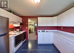 Plenty of cupboard space in lower level kitchen - 