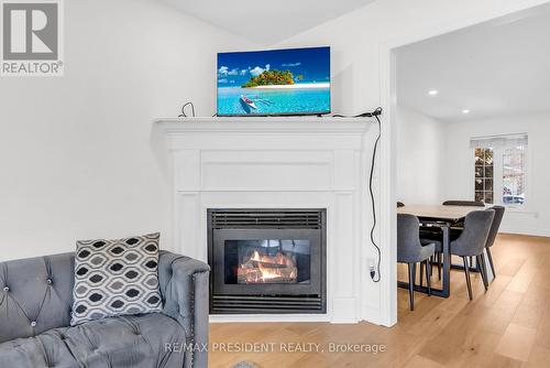 7031 Graydon Court, Mississauga, ON - Indoor Photo Showing Living Room With Fireplace