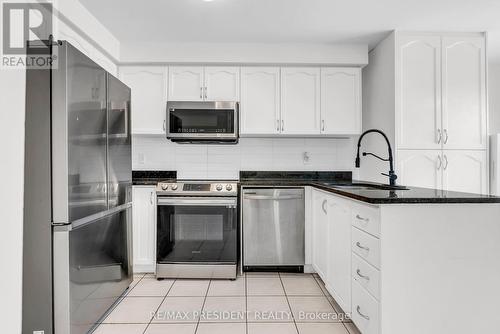 7031 Graydon Court, Mississauga, ON - Indoor Photo Showing Kitchen With Stainless Steel Kitchen
