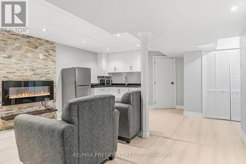 7031 Graydon Court, Mississauga, ON - Indoor Photo Showing Other Room With Fireplace