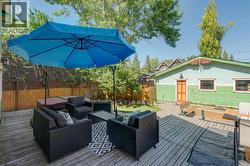 back deck overlooking firepit, garage and yard - 