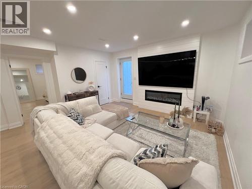 31 Colin Crescent, Hamilton, ON - Indoor Photo Showing Living Room With Fireplace