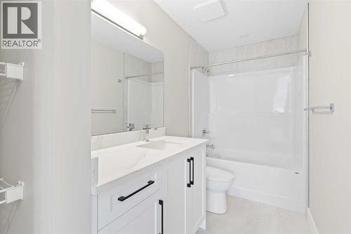 56 Bridges Drive, Langdon, AB - Indoor Photo Showing Bathroom