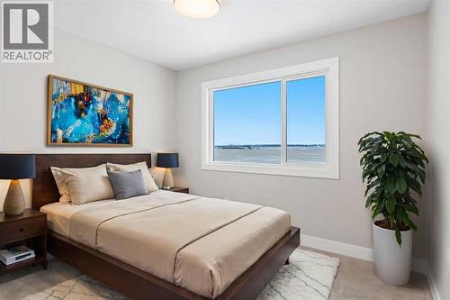 56 Bridges Drive, Langdon, AB - Indoor Photo Showing Bedroom