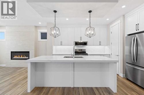 56 Bridges Drive, Langdon, AB - Indoor Photo Showing Kitchen With Upgraded Kitchen