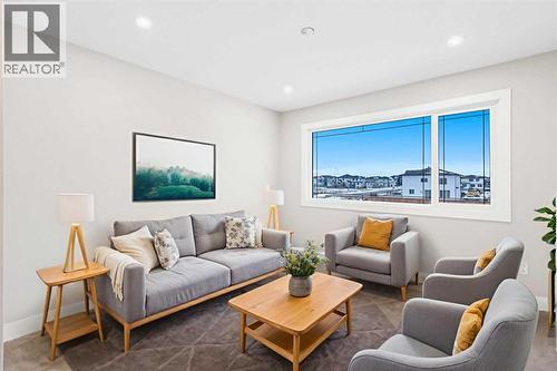 56 Bridges Drive, Langdon, AB - Indoor Photo Showing Living Room