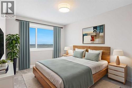 56 Bridges Drive, Langdon, AB - Indoor Photo Showing Bedroom