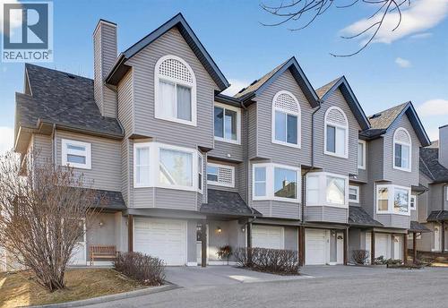 41 Sandarac Villas Nw, Calgary, AB - Outdoor With Facade