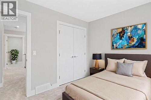 60 Bridges Drive, Langdon, AB - Indoor Photo Showing Bedroom