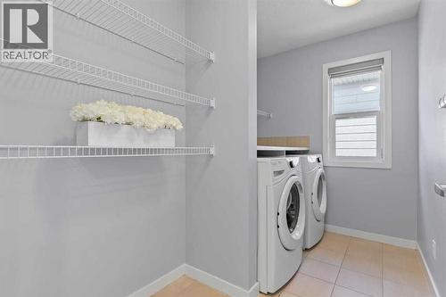 184 Masters Rise Se, Calgary, AB - Indoor Photo Showing Laundry Room