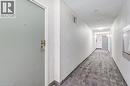 Hall featuring carpet floors and a textured ceiling - 3845 Lakeshore Boulevard W Unit# 804, Etobicoke, ON  - Indoor Photo Showing Other Room 