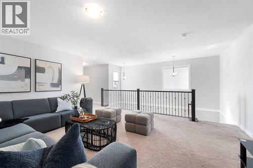 153 Williamstown Park Nw, Airdrie, AB - Indoor Photo Showing Living Room