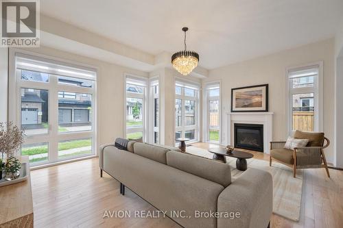 2417 Edward Leaver Trail, Oakville, ON - Indoor Photo Showing Living Room With Fireplace