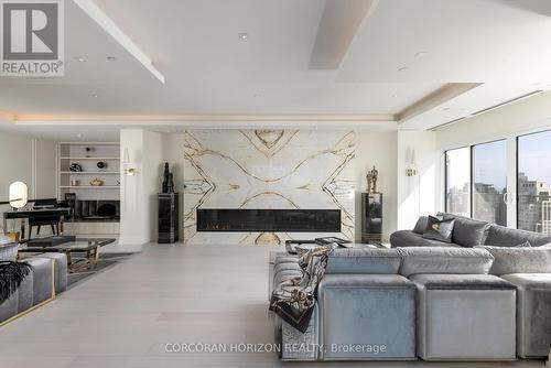 3802 - 200 Cumberland Street, Toronto, ON - Indoor Photo Showing Living Room With Fireplace