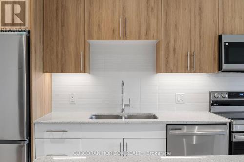 610 - 525 New Dundee Road, Kitchener, ON - Indoor Photo Showing Kitchen With Stainless Steel Kitchen With Double Sink With Upgraded Kitchen