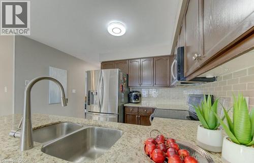 23 Michelle Court, Kitchener, ON - Indoor Photo Showing Kitchen With Double Sink