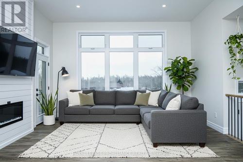 Virtually Staged - 2778 Springbrook Road, Stirling-Rawdon (Rawdon Ward), ON - Indoor Photo Showing Living Room With Fireplace