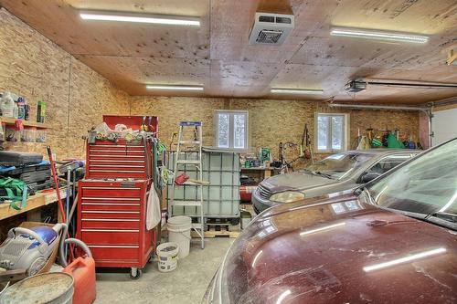 Garage - 116 Ch. Des Pins, Lambton, QC - Indoor Photo Showing Garage