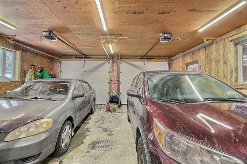Garage - 116 Ch. Des Pins, Lambton, QC - Indoor Photo Showing Garage
